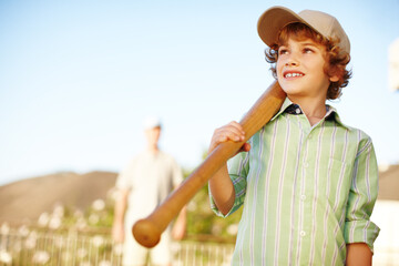 Boy, bat and baseball with smile, outdoor and backyard in games with dad for love, bonding and...