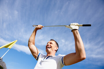 Happy man, winning and golfer with club in celebration for victory, achievement or point with blue...