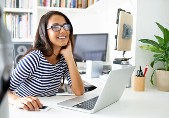 Woman, laptop and freelancer on internet in portrait, online and research for information on article. Female person, glasses and copywriter on website, remote work and email for networking in home