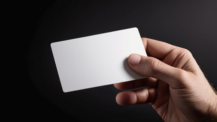 male hand holding white card business card