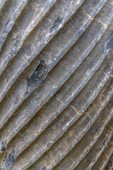Black, grey, And white striated streaks In marble. Close up. Aged photo. Marble column Texture. C