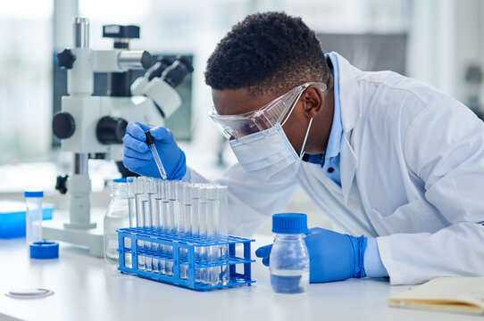 Black man, scientist and dropper in test tube for research, chemical liquid and vaccine in container. Gloves, doctor and person for forensic exam in lab or pharma, genetics and innovation in medicine