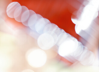 Abstract white color blobs bokeh red background