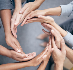 Teamwork, hands and community of diverse people in circle for unity, corporate partnership and hope...