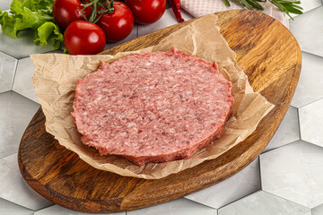 Raw beef uncooked burger cutlet