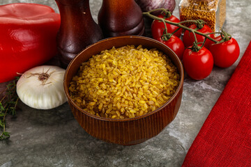 Dry wheat bulgur cereal heap