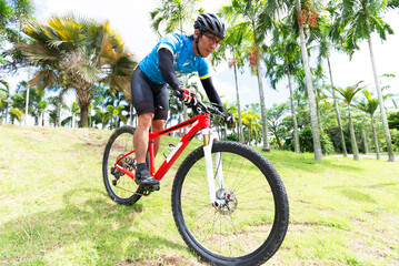 Naklejka premium Asian men are cycling road bike in the morning