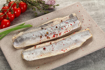 Marinated herring fillet with green onion