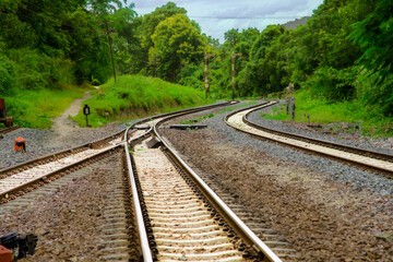 Railway tracks amidst the mountains at Khun Tan Station