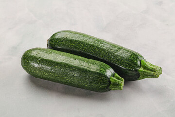Raw green ripe zucchini vegetable