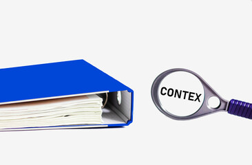 Context, business concept image. On a magnifying glass the word Contex on a white background with a...