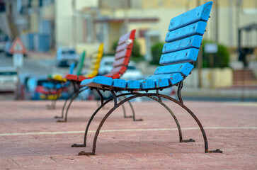 Empty Bench on a Quiet Street,by the sea on waking side  Capturing Urban Tranquilitybench in the street