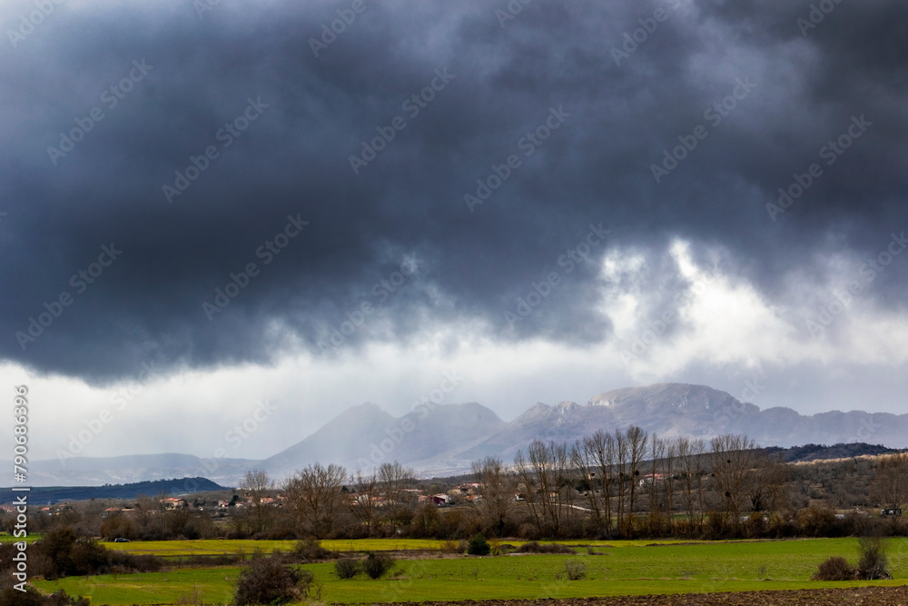 Poster storm over the mountains