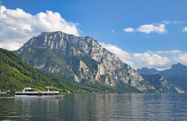 Ferry boat sails on Lake Traun Traunsee in Upper Austria - 790692399