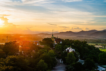 landscape of Wat Phra That Doi Saket from a high angle during the setting sun.