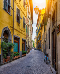 Fototapeta na wymiar Narrow old cozy street in Lucca, Italy