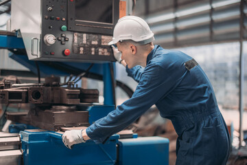 Fototapeta na wymiar Technician adjusts and troubleshoots factory machinery for optimal performance and safety standard