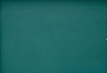 Dark green color old grunge wall concrete texture as background.