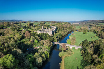 Aerial view of Lismore Castle, County Waterford, Ireland, on a tranquil spring day under a flawless...