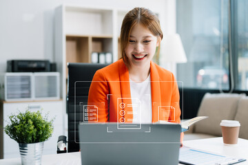 Asian businesswoman working with working notepad, tablet and laptop documents in the office .E-document management Paperless workplace, e-signing, electronic signature, document management. 