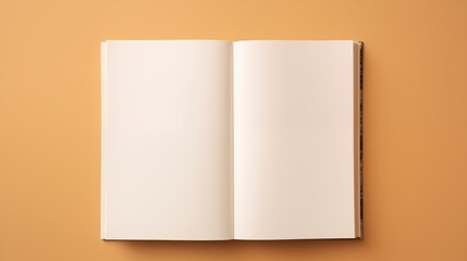 An open hardcover book with blank pages on a tan background - obrazy, fototapety, plakaty