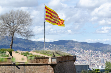 Montjuic Castle, wall and flag, Barcelona, Catalonia, Spain
