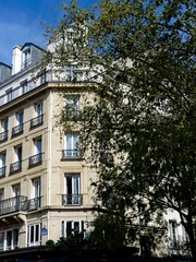 Obraz premium Paris, September 2022 : Visit of the magnificent city of Paris, Capital of France - View on different facades of buildings built by Baron Haussmann