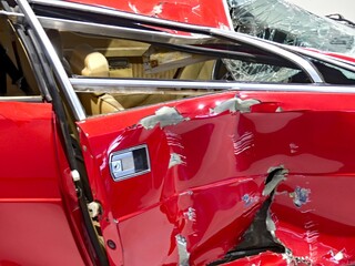Red car after a road accident