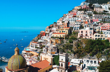 Colorful Positano Coastline Under Sunny Blue Sky in Italy