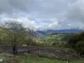 Tseylomsky pass in Ingushetia. A trip uphill to the Tsei Loam pass on a cloudy spring day. Panorama...