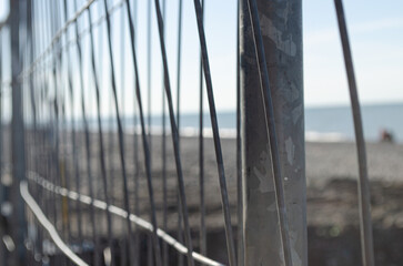 Metal fence on the beach