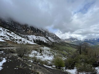 Tseylomsky pass in Ingushetia. A trip uphill to the Tsei Loam pass on a cloudy spring day. Panorama...