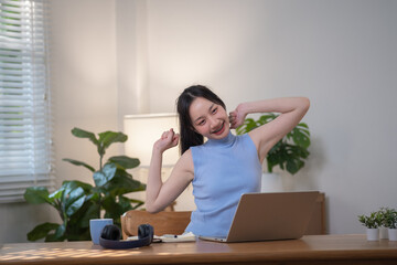 Happy Asian woman education learning by technology e-learning by computer, Learning online on...