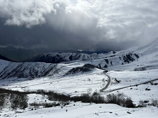 Tseylomsky pass in Ingushetia. A trip uphill to the Tsei Loam pass on a cloudy spring day. Panorama...