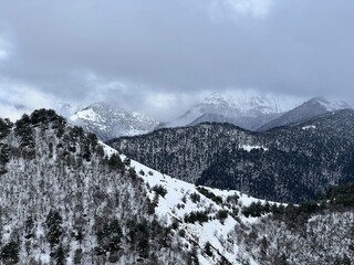 Tseylomsky pass in Ingushetia. A trip uphill to the Tsei Loam pass on a cloudy spring day. Panorama...