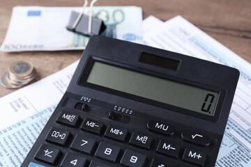 Tax accounting. Calculator, document and money on table, closeup