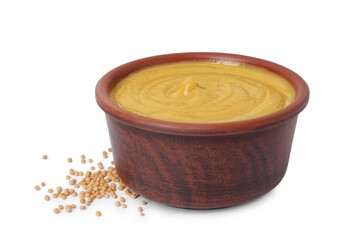 Fresh tasty mustard sauce in bowl and dry seeds isolated on white