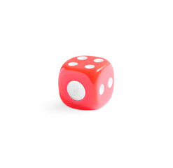 One red game dice isolated on white