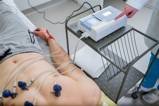 Precision in progress, technician conducting a cardiac stress test in a modern clinic