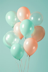 A bunch of balloons in muted colors, such as peach and mint green, float against an isolated light blue background