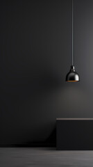 Black wall background with a hanging light bulb
