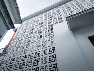 photography of pattern checkered motif on the wall mosque suitable for texture backgrounds