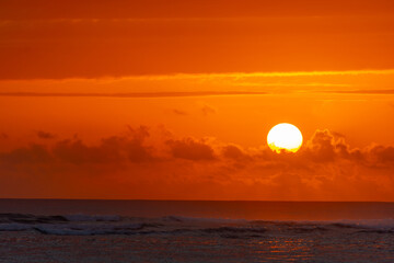 Superb sunrise on a pretty beach in Punta Cana in the Dominican Republic - obrazy, fototapety, plakaty