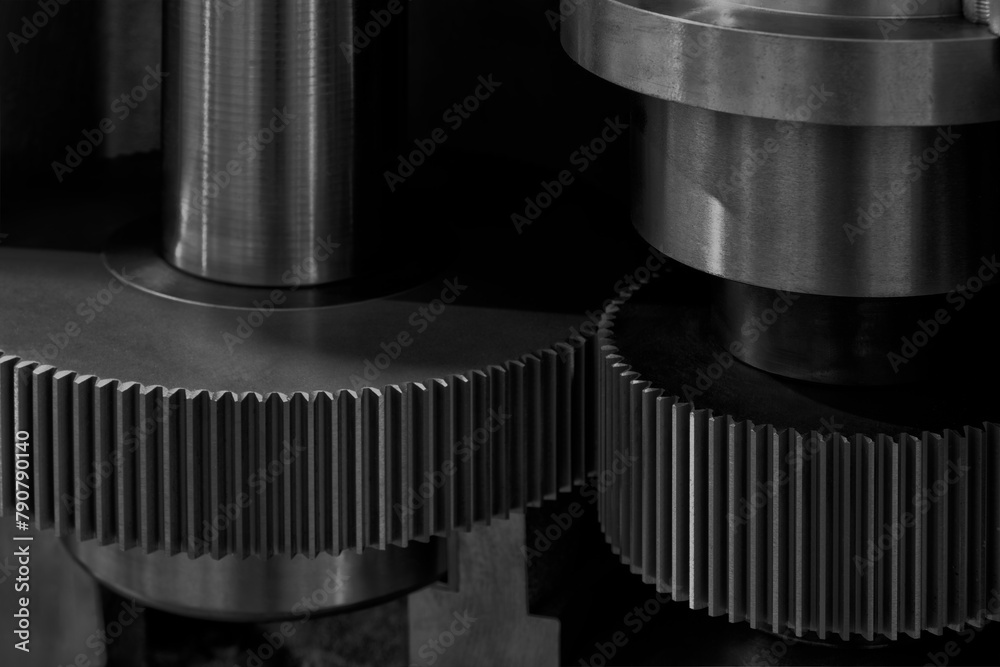 Poster Two gears are shown in close up, one of which is missing a tooth. Concept of precision and complexity, as gears are essential components in many machines and mechanisms