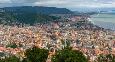 Fototapeta na wymiar Densely populated areas of the Italian city of Salerno. Salerno is a city and port on the Tyrrhenian Sea in southern Italy, the administrative center of the Salerno province of the Campania region.