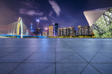 City square floors with modern buildings at night in Guangzhou - obrazy, fototapety, plakaty