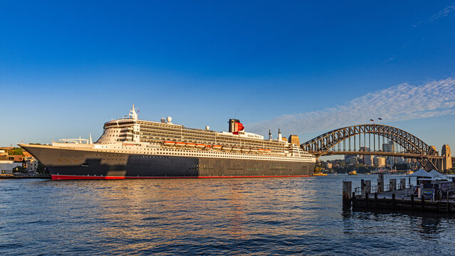 Sydney, New South Wales, Australia; February 27, 2024: The beautiful transatlantic ocean liner Queen Mary 2 is anchored in Sydney Harbour.