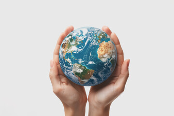 Female hands holding Earth isolated on a white background. World Earth Day, environment.