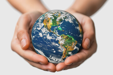 Female hands holding Earth isolated on a white background. World Earth Day, environment.