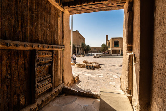Riyadh, Saudi Arabia - February 10 2023: Entrance gate of the Masmak fort in Riyadh old town that gives a view on the Alsafat Square in Saudi Arabia capital city.